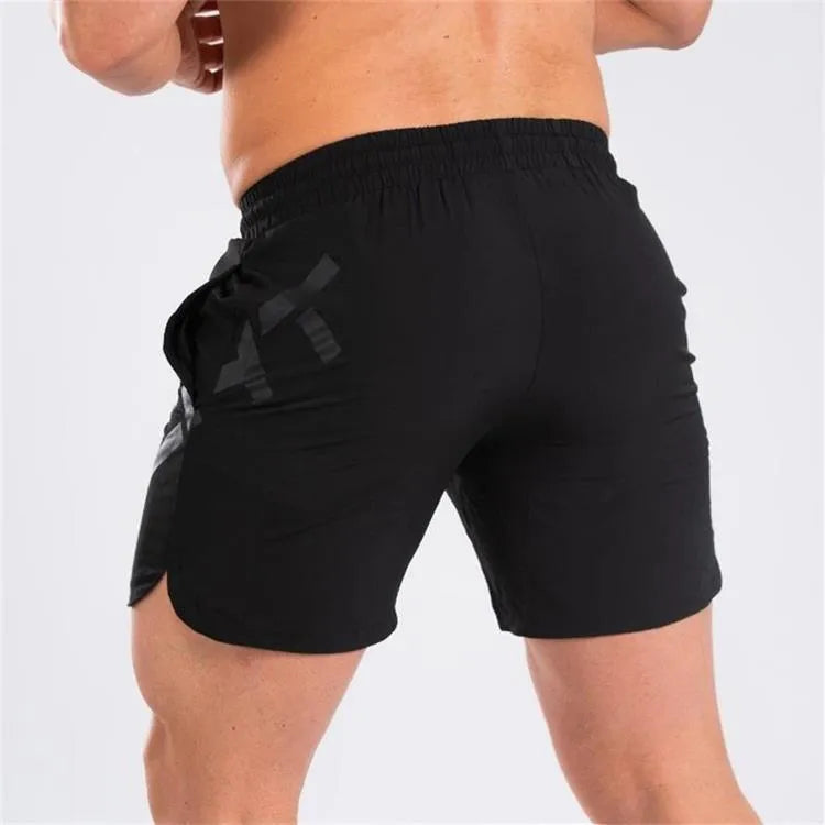 Men's elastic thin training running shorts in knee-length style with quick-drying nylon blend fabric