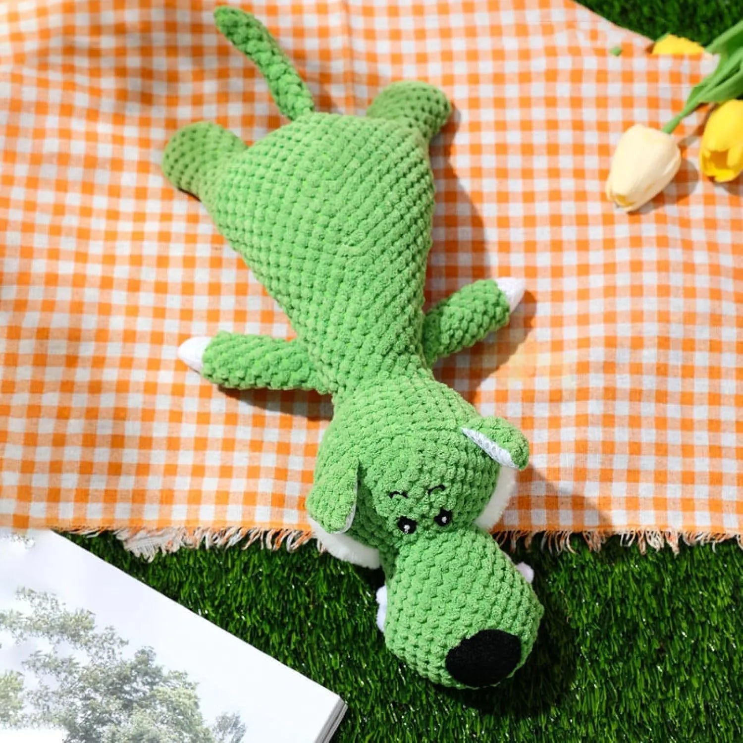 Green corn cob shaped plush dog toy for grinding teeth with textured kernel design.