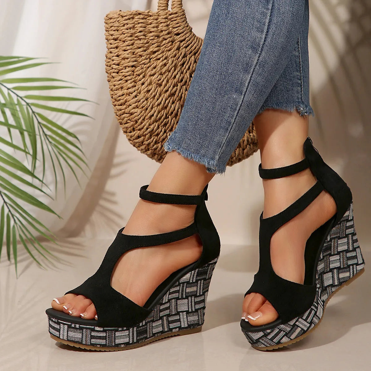 Women's cream white ankle-strap sandals with thick rubber sole, buckle closure, and cloth upper.