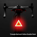 USB rechargeable bicycle taillight with flowing red light pattern, mounted on a bike