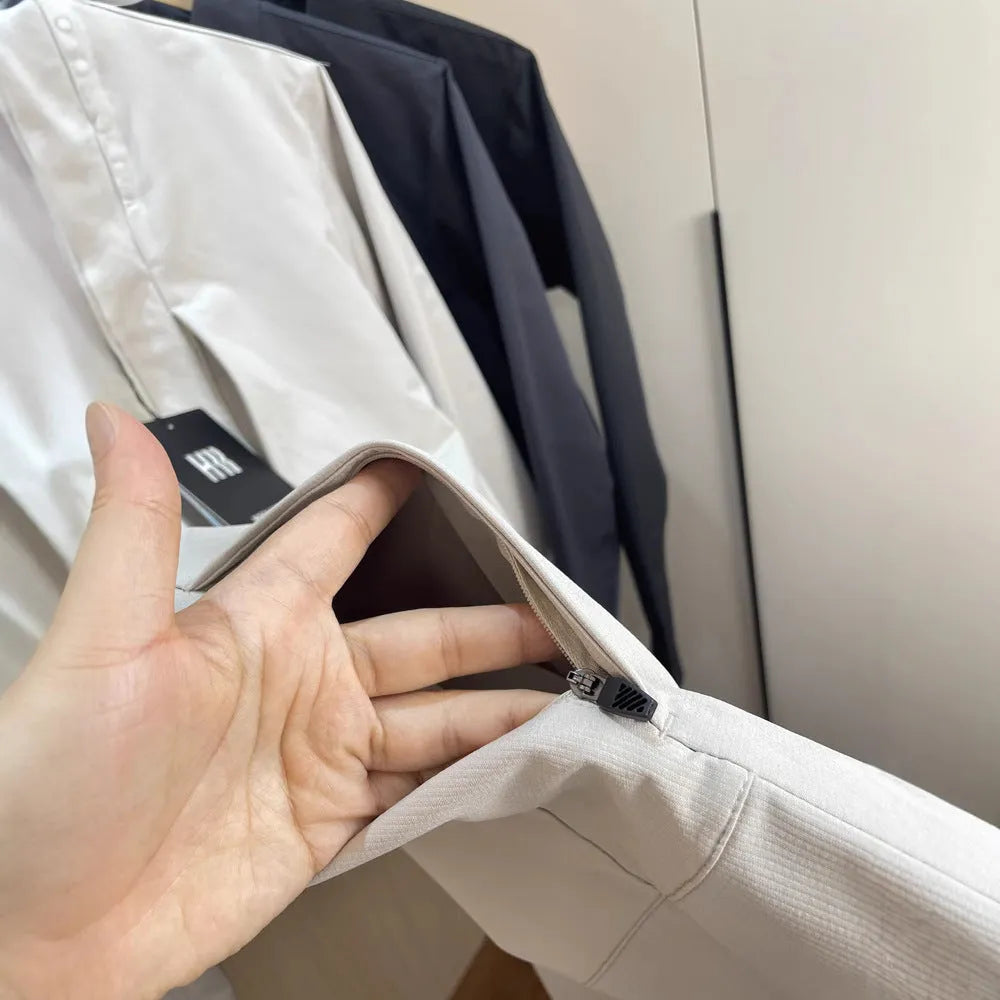 Man wearing a stand collar straight hem casual sports jacket in polyester fabric.