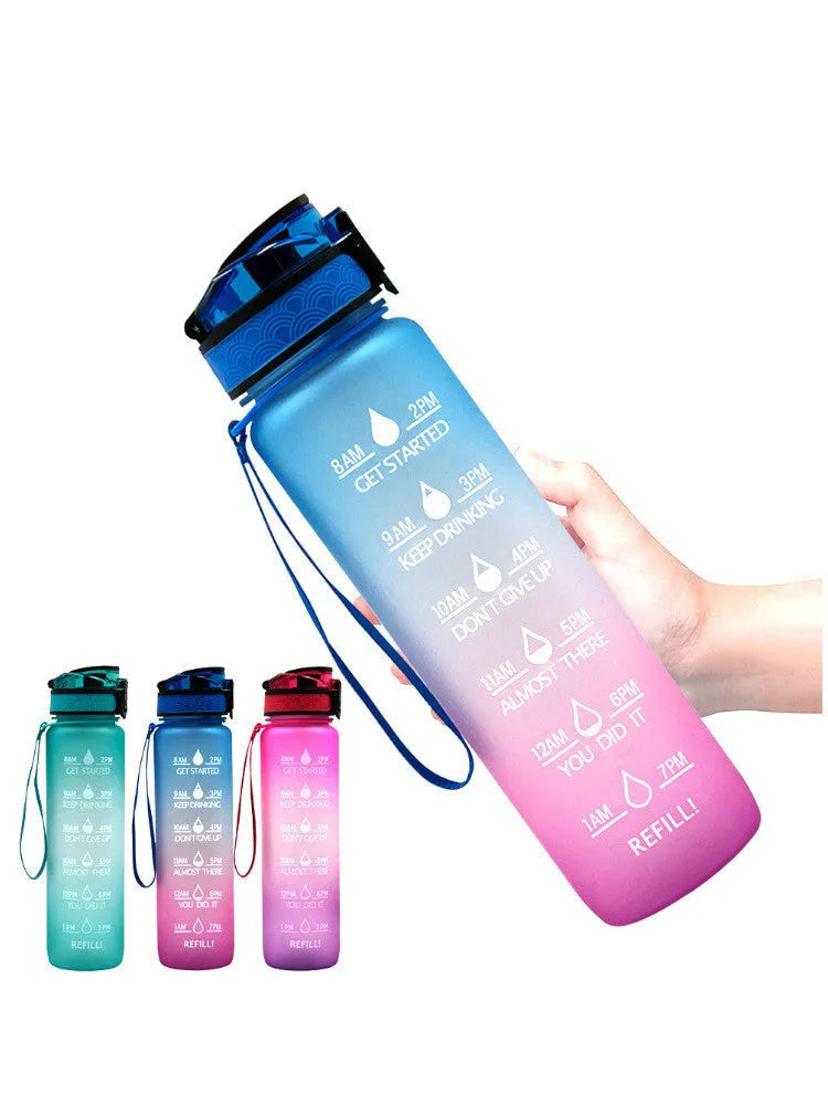Transparent 1000ml plastic water bottle showing clear Tritan construction with visible liquid