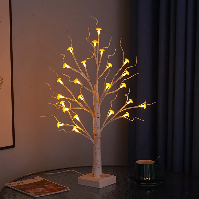 60cm tall white birch tree LED lamp with small red detachable mushroom flowers on a table.
