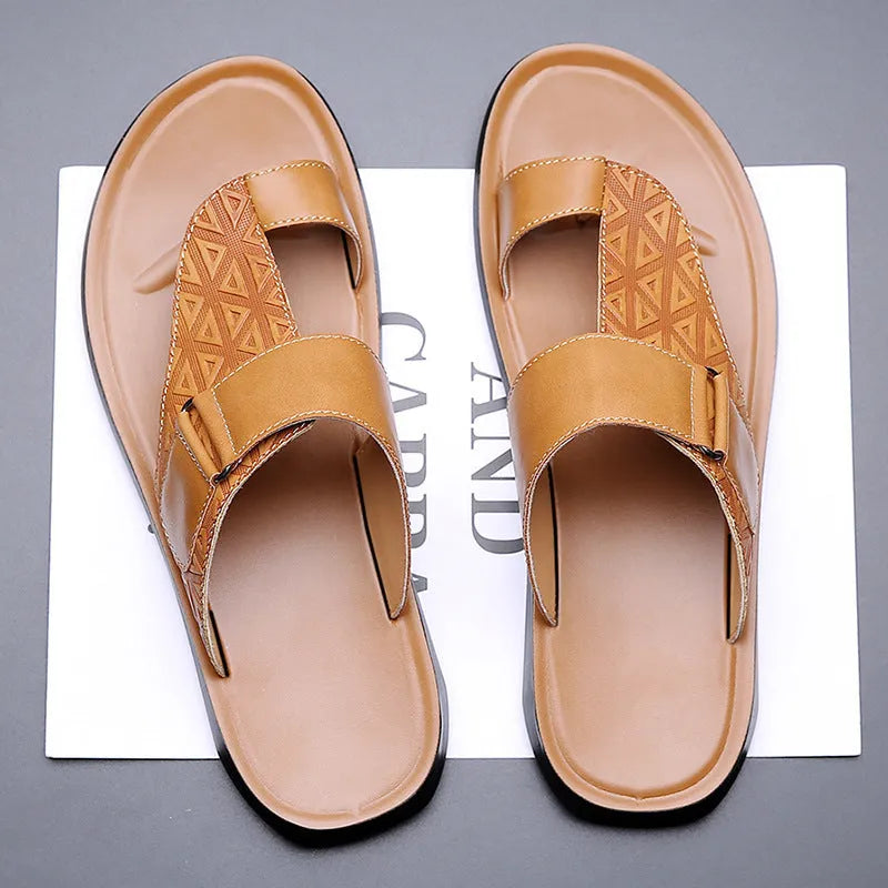 Men's white open-toe cowhide leather slippers with a rubber sole on a casual background