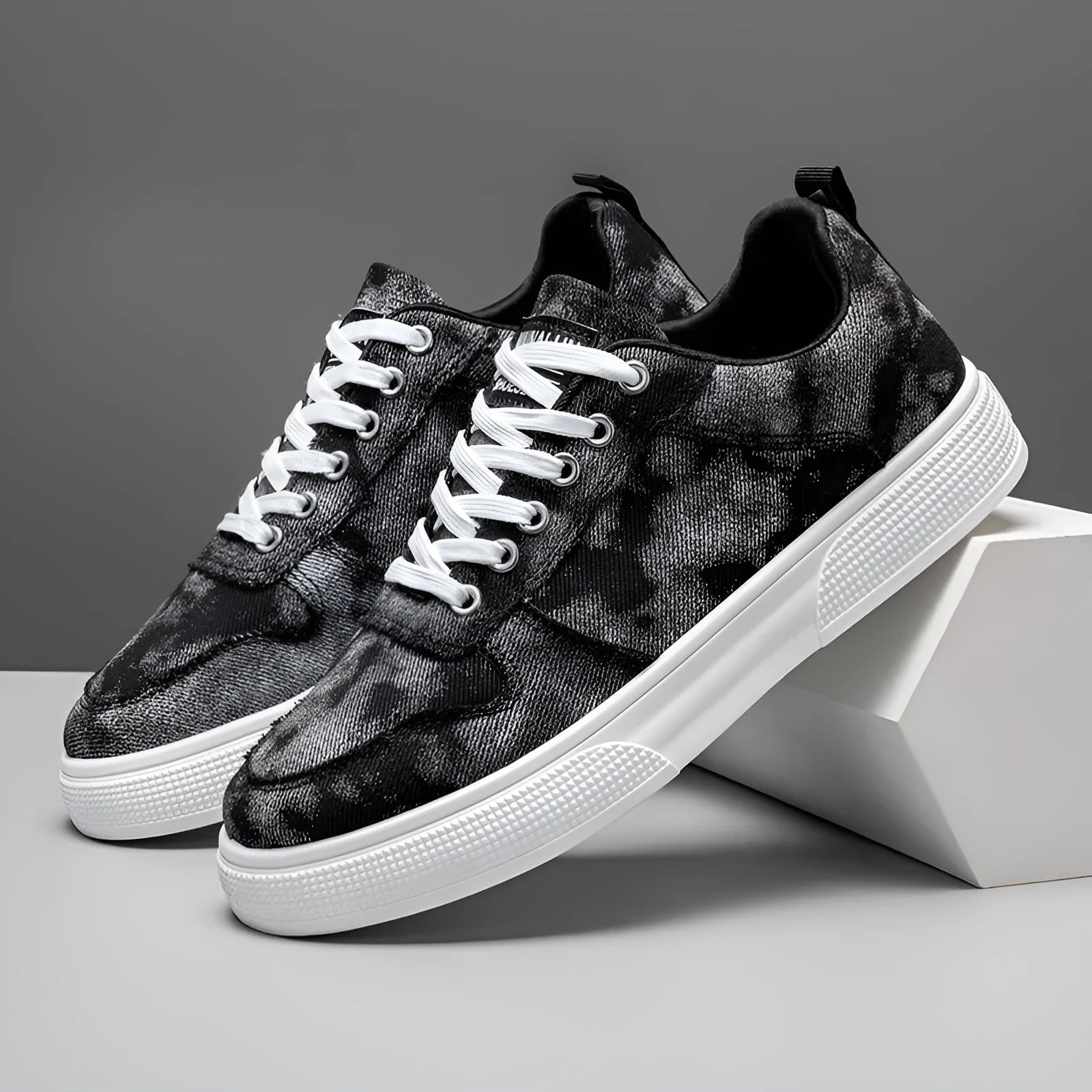 Men's low-top blue canvas sneakers with white platform sole and lace-up front.