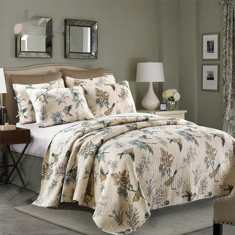 Pure cotton bedspread and pillowcase set in a patterned design on a bed.
