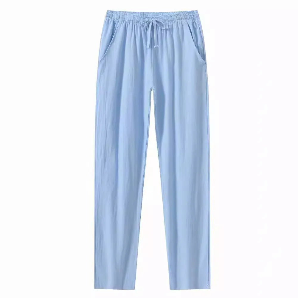 Men's cotton linen beach trousers in loose fit showing solid colour options