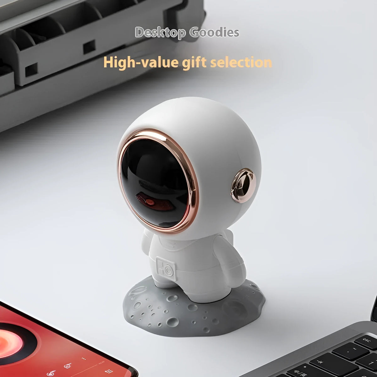 Spaceman moon astronaut Bluetooth speaker in white gold colour as desktop decoration