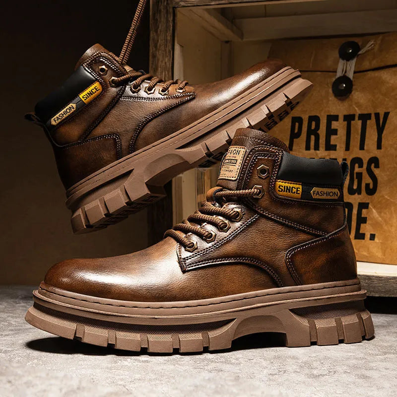 Men's brown lace-up Martin boots with round toe and rubber sole on a neutral background