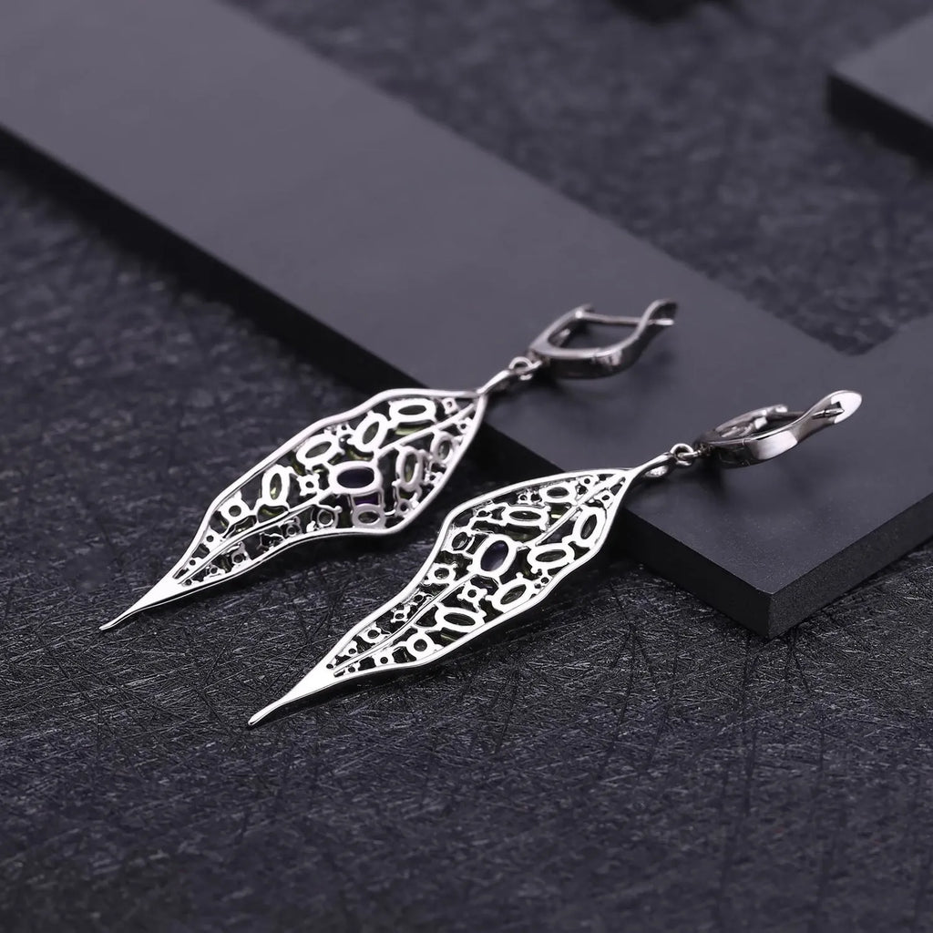 Women's 925 sterling silver earrings with purple amethyst and green olivine gems in a retro style