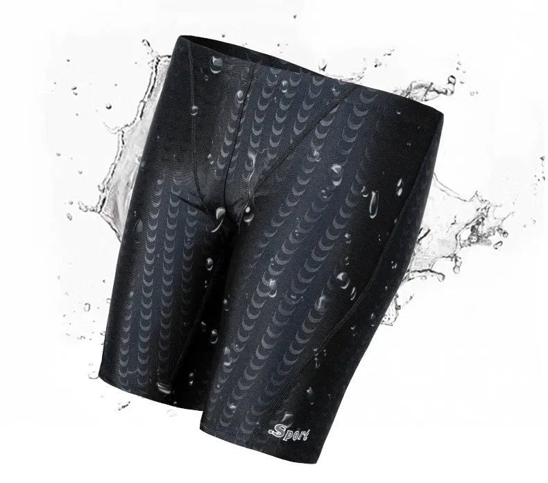Men's solid colour swimming trunks in waterproof polyester fabric available in larger sizes