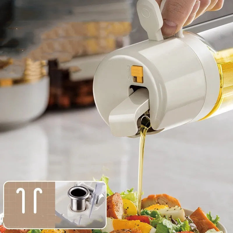 Warm grey 550ml glass oil sprayer bottle with switchable spray/pour cap on kitchen counter