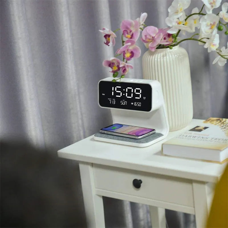 White 3-in-1 bedside lamp with wireless charging pad, LCD alarm clock display, and touch controls.
