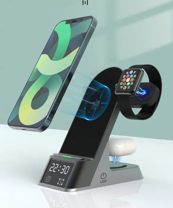 Black six-in-one wireless charging alarm clock showing phone, Apple Watch, and earphones on charging areas.