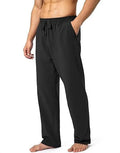 Men's loose fit quick-dry trousers in dark grey colour for sports and leisure activities