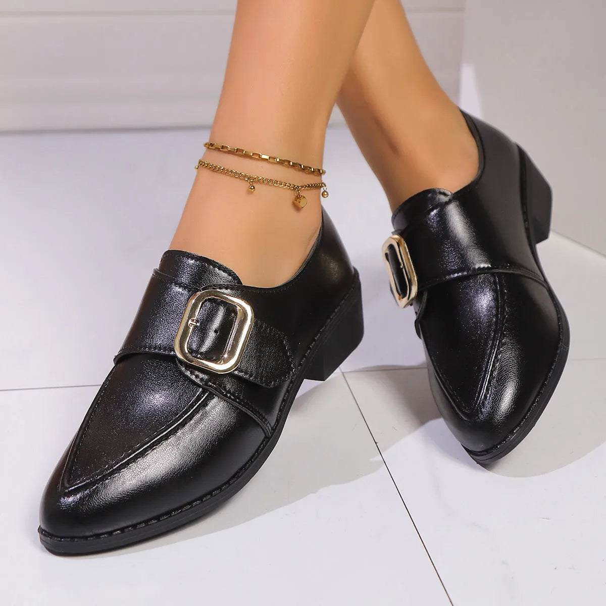 Women's slip-on shoe with a decorative bow on a pointed toe, available in buckle big bow or small bowknot styles.