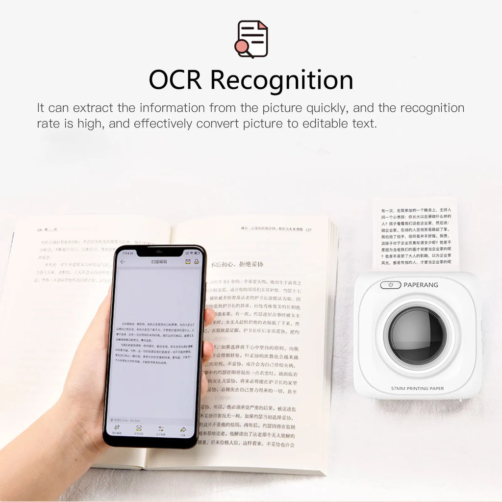 White pocket Bluetooth thermal label printer PAPERANG P2 on a table with smartphone app interface