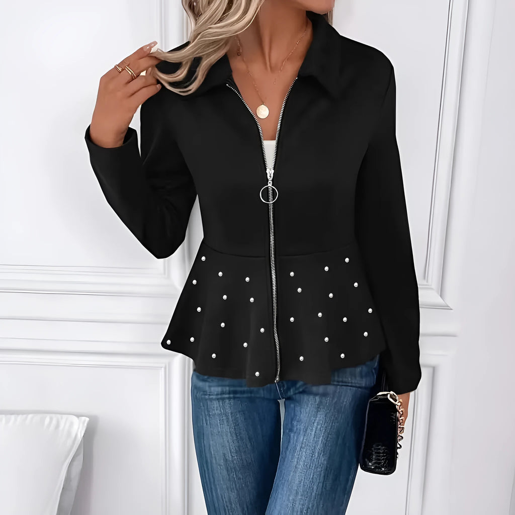 Women's black coat with beaded heavy-duty zipper and ruffled hem, loose fit, long sleeves.