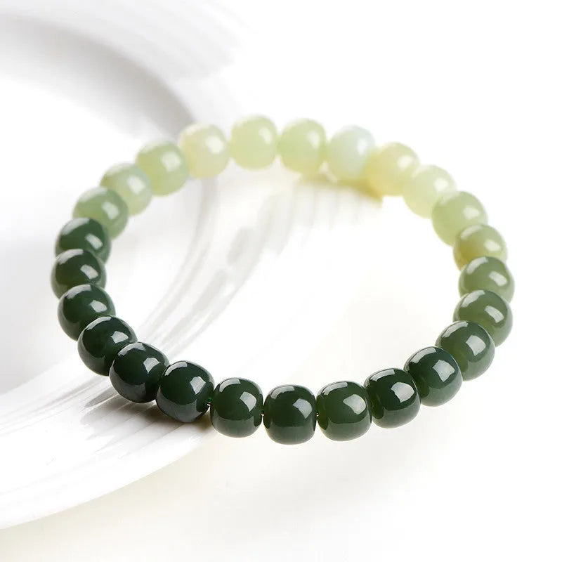 Hetian Jade bracelet with water gradient colour on polished beads.