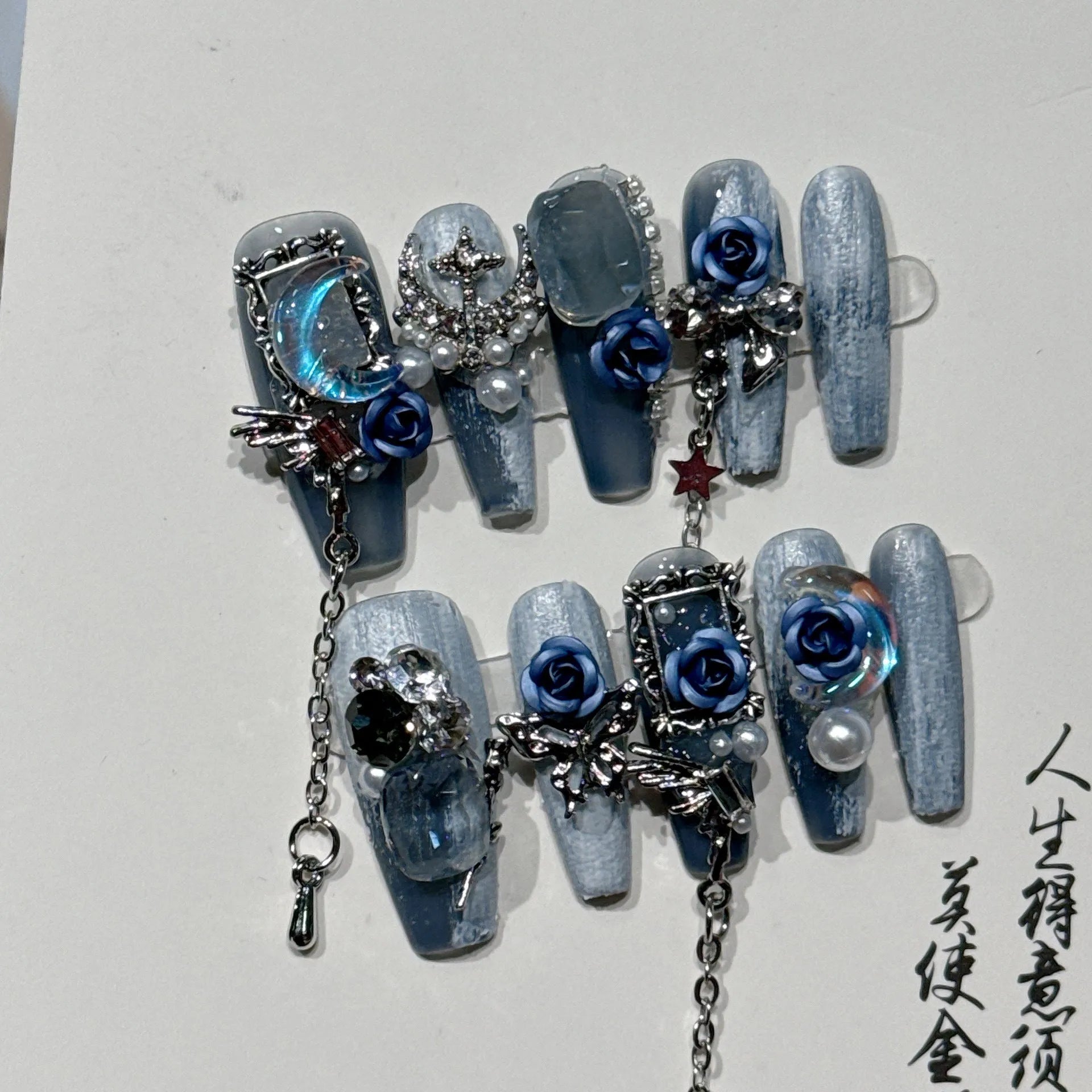 Heavy industry blue false nails with ornate rose and tulip floral pattern design in sizes XS S M L