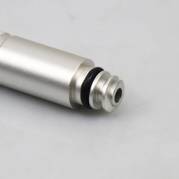 Silver metal VAS6262-9 transmission refueling joint tool on a workshop bench.