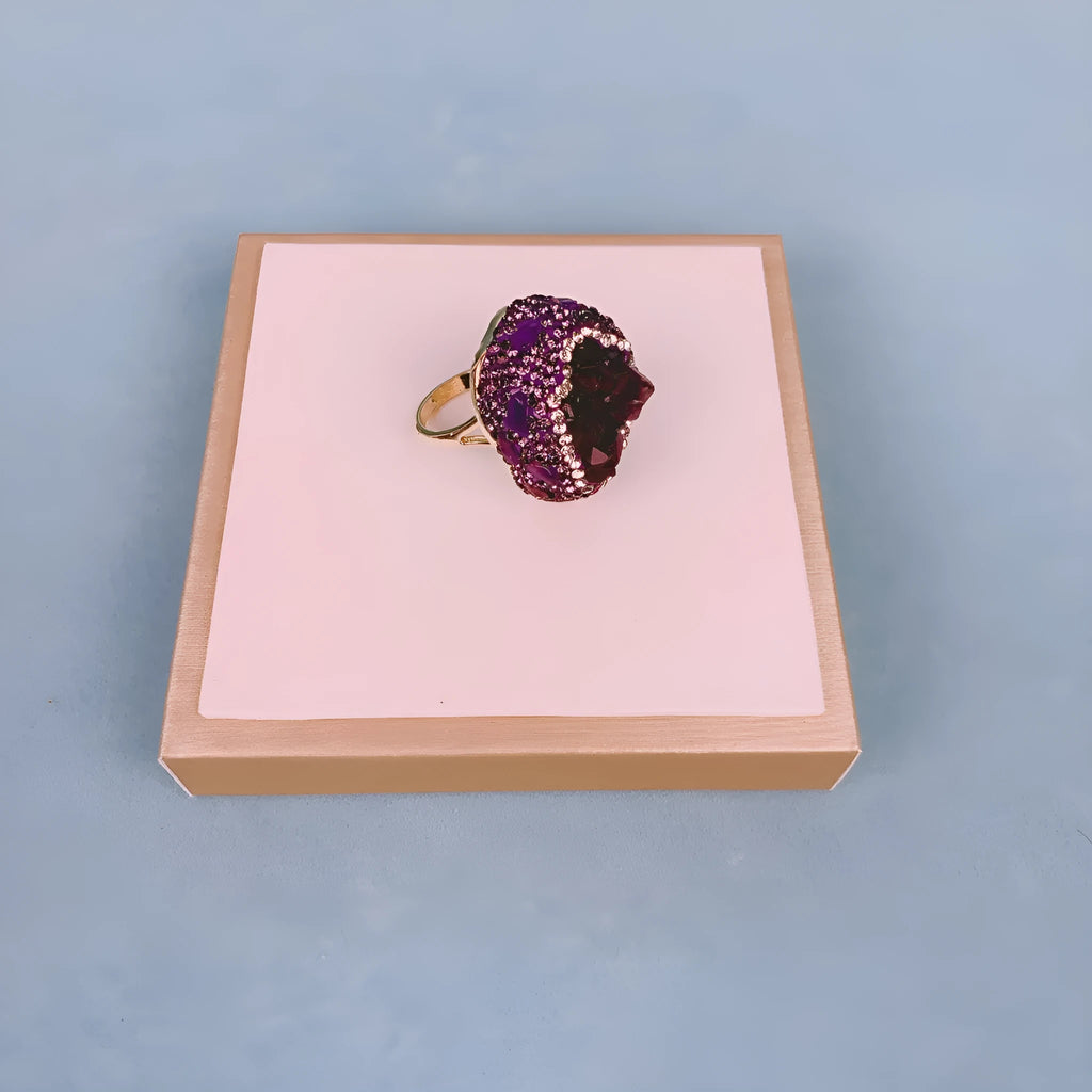 Natural Uruguay amethyst open adjustable ring in deep purple colour on a clean background