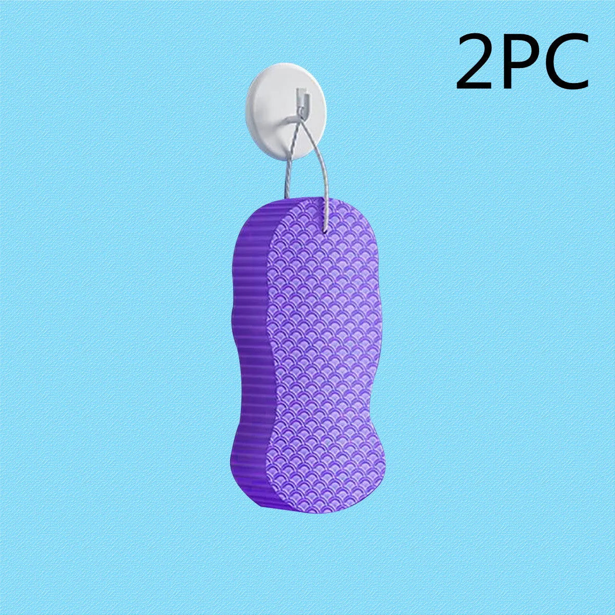 White 3D fish scale pattern bath sponge with hang loop on a bathroom background.