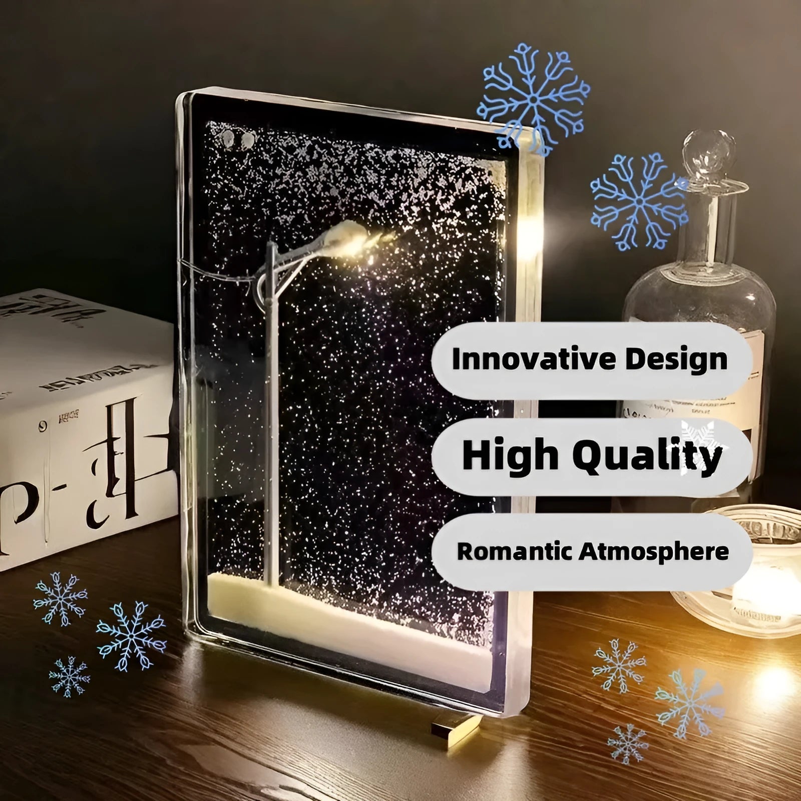 DIY Christmas night light kit showing snowy landscape scene with glowing street light and flowing snow effect