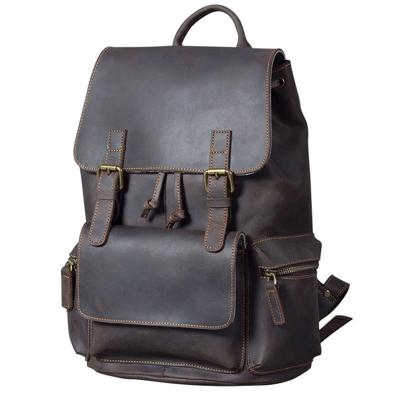 Brown retro-style leather backpack with shoulder straps, made from first layer cowhide with denim lining.
