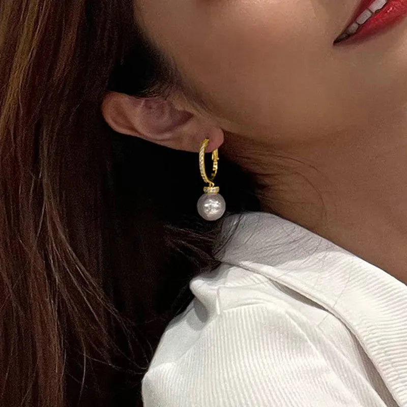Yellow gold copper earrings with imitation pearl and zircon inlay geometric round ring style