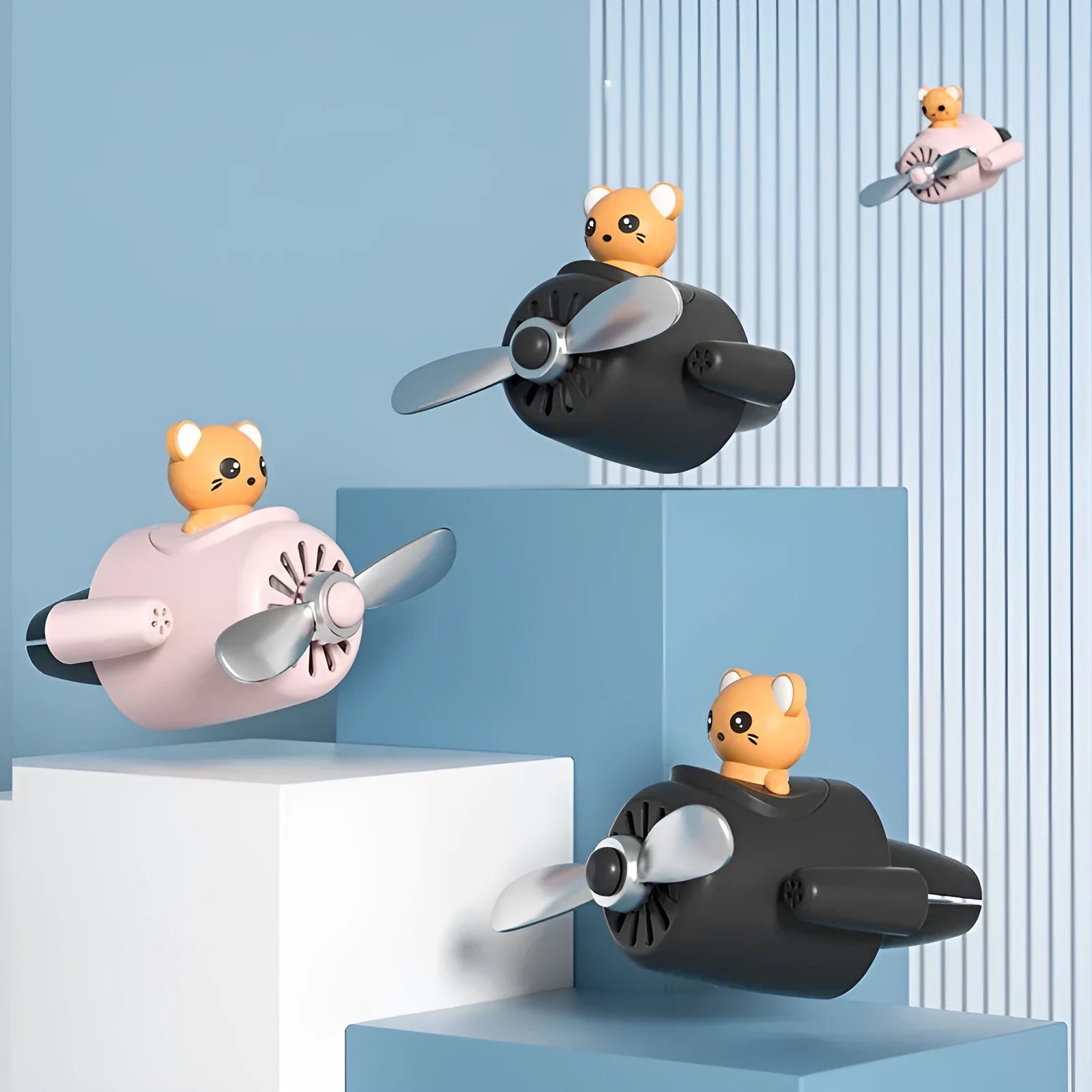 Cartoon aeroplane-shaped plastic car air vent aromatherapy diffuser with fragrant inserts.