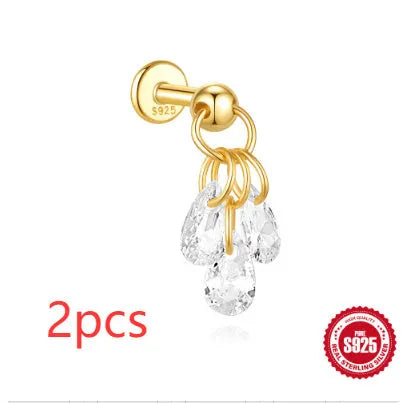 S925 sterling silver moon and star shaped earrings with diamond details on a gold-tone finish.
