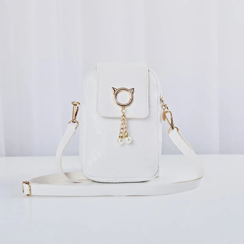 Women's crossbody phone bag with woven pattern, pearl tassel, zipper closure, and bill holder in medium square shape.
