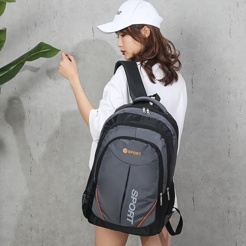 Large nylon backpack with curved shoulder straps in black, blue, grey, or red colours showing 20-35L capacity