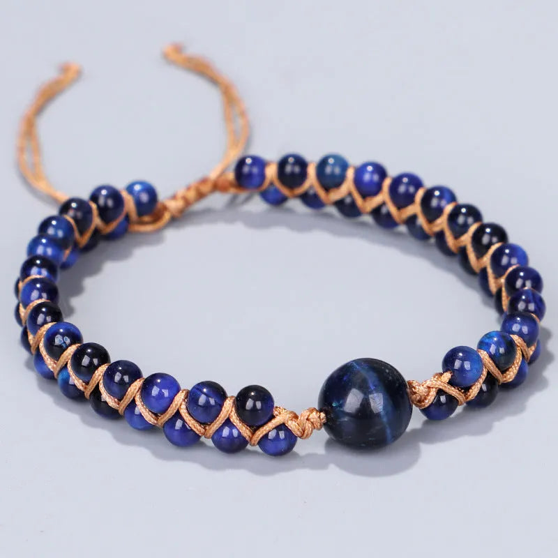 Handmade woven geometric pull bracelet with Tigereye and Amethyst beads in blue and purple colours