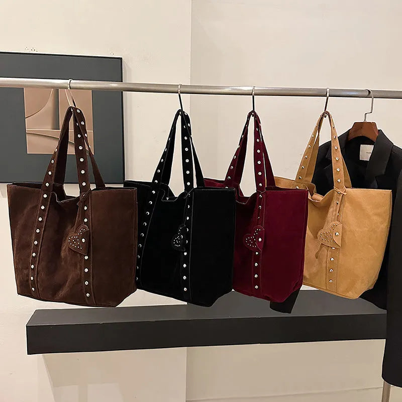 Black PU leather tote bag with double shoulder straps showing sandwich pocket and horizontal square shape