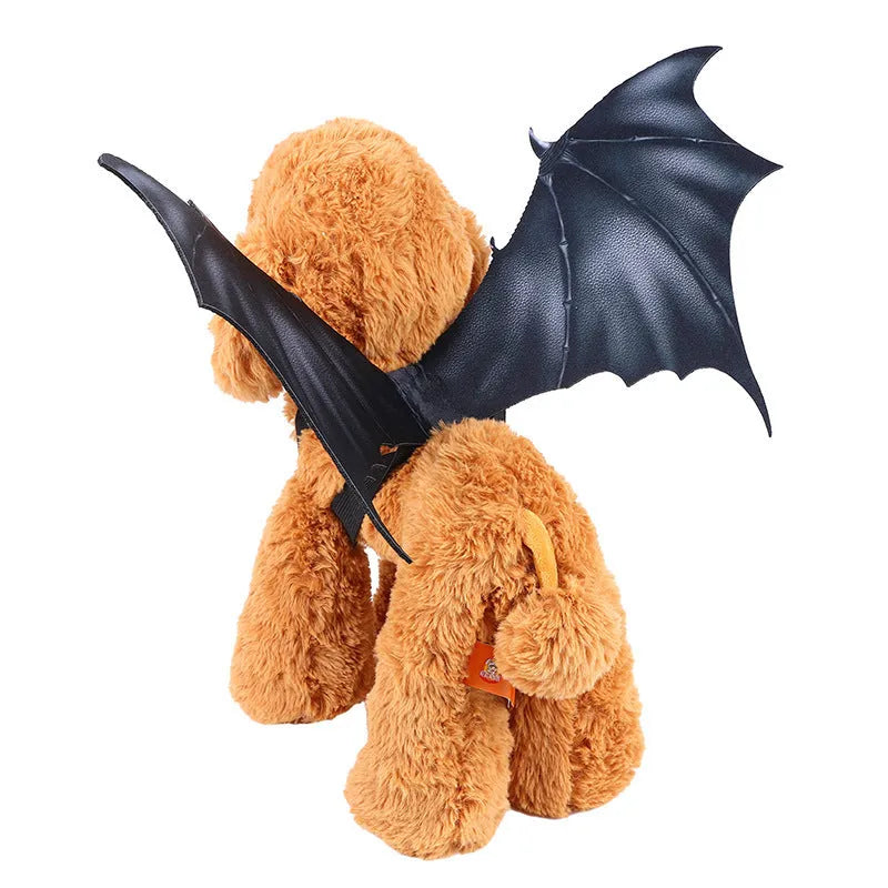 Black cloth bat wings Halloween costume accessory for a dog or cat, showing three size options.