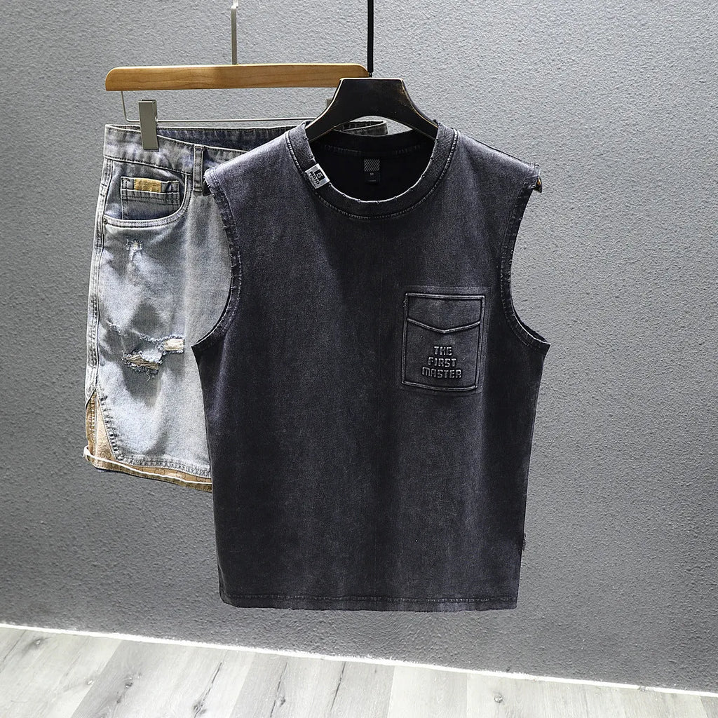 Men's solid black loose fit cotton sleeveless t-shirt with a straight hem.