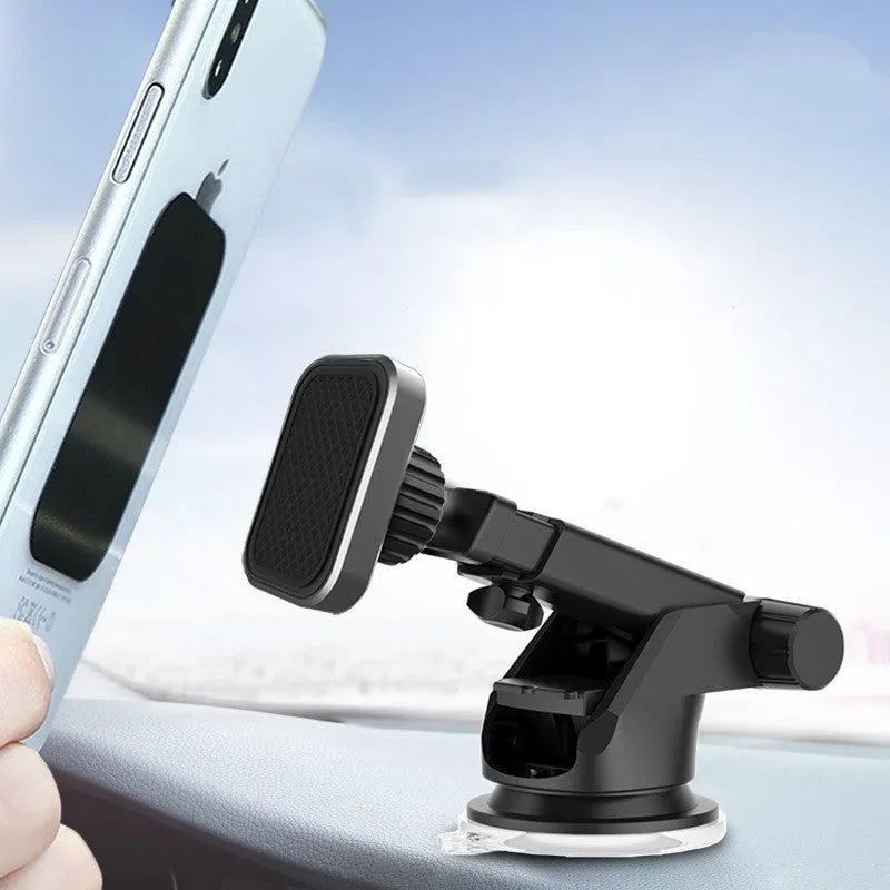 Magnetic suction car phone bracket in grey ABS PVC material on car dashboard