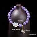 Purple geometric bracelet with aquamarine and lychee jelly agate beads in 6mm, 8mm, and 12x16mm sizes.