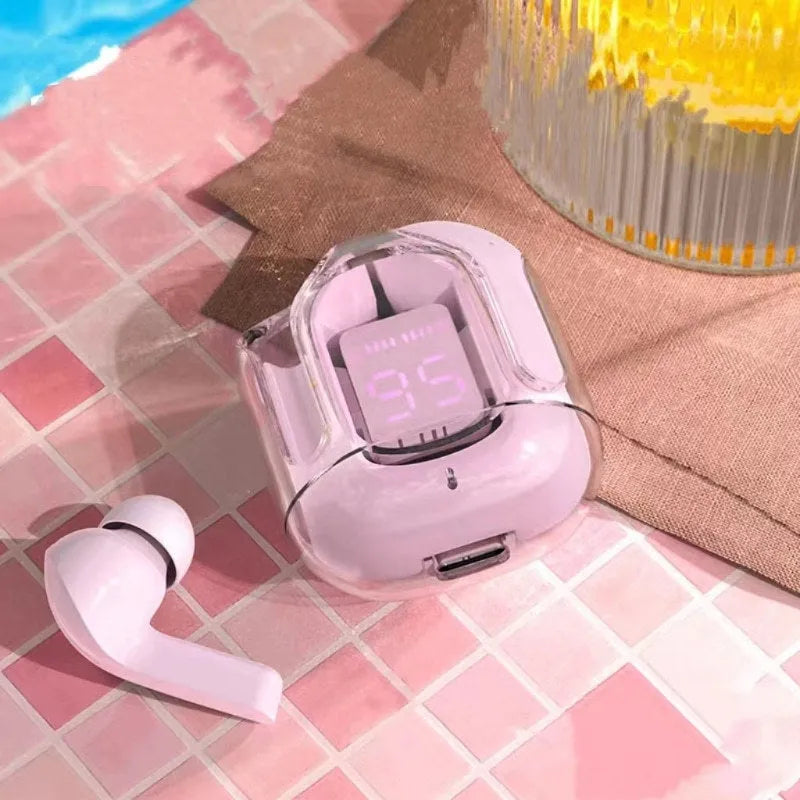 Transparent space capsule case containing true wireless Bluetooth earphones in various colour options