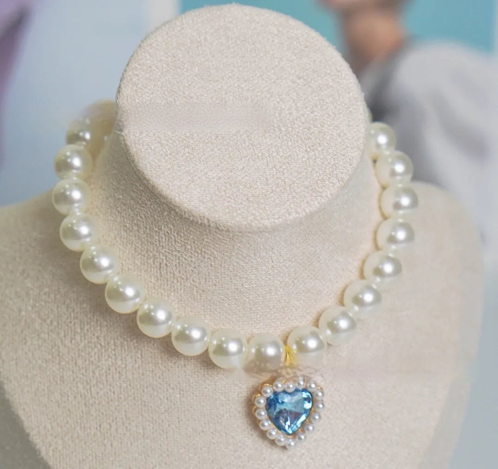 Decorative cat collar with plastic alloy resin construction and central gemstone charm in multiple colour options
