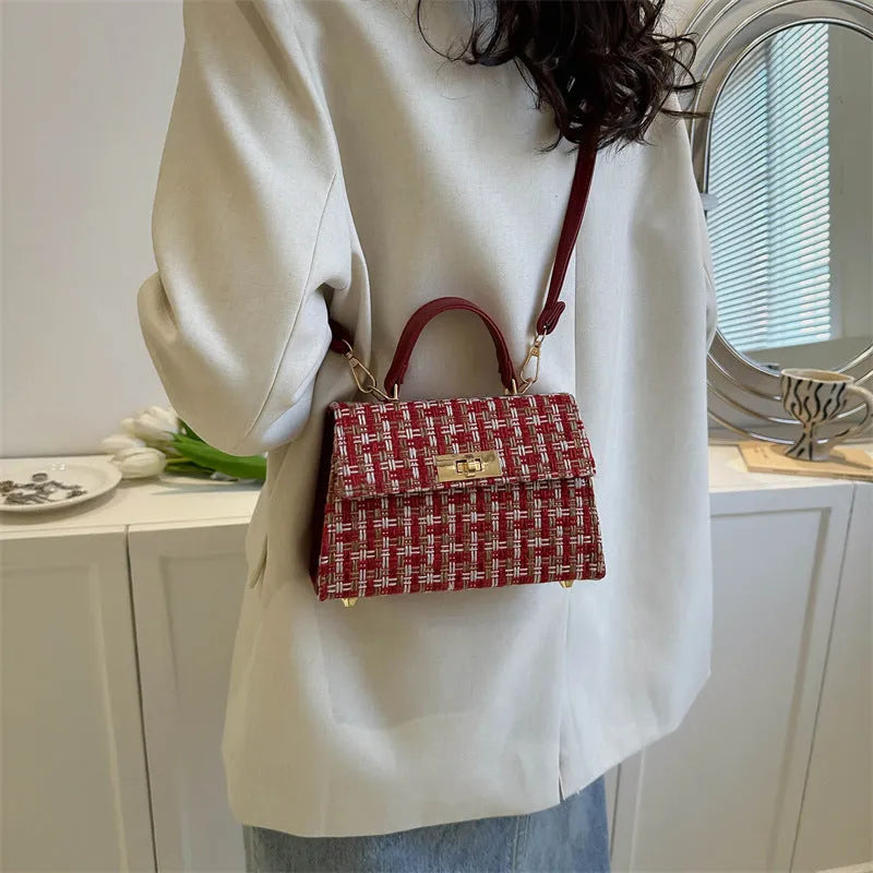 Casual PU crossbody shoulder bag in black with minimal design and strap