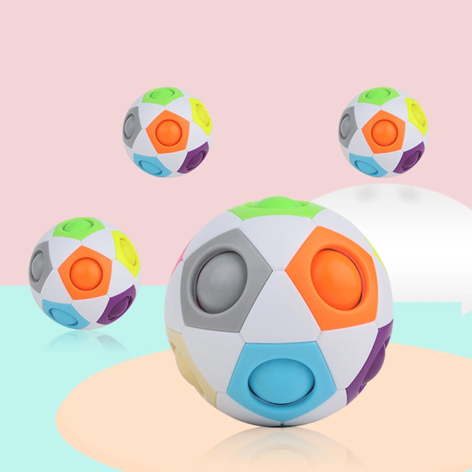 Rainbow coloured ball puzzle with moveable pieces inside a clear plastic sphere.