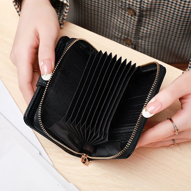 Ladies' short wallet with lychee pattern in PU material showing 2-fold design