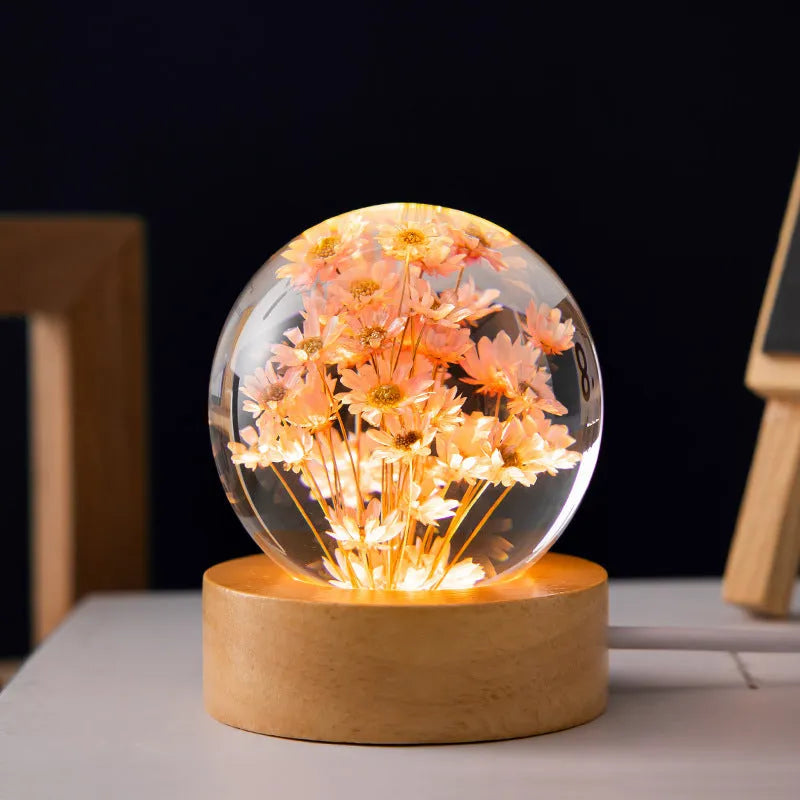 3D dandelion flower inside a 60mm clear crystal ball night light on a beech wood stand