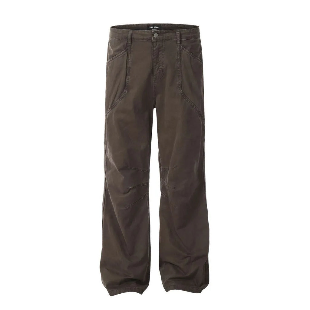 Men's brown loose-fit high-waisted straight-leg cotton trousers on a hanger.