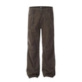 Men's brown loose-fit high-waisted straight-leg cotton trousers on a hanger.