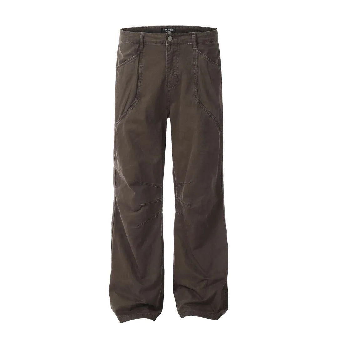 Men's brown loose-fit high-waisted straight-leg cotton trousers on a hanger.