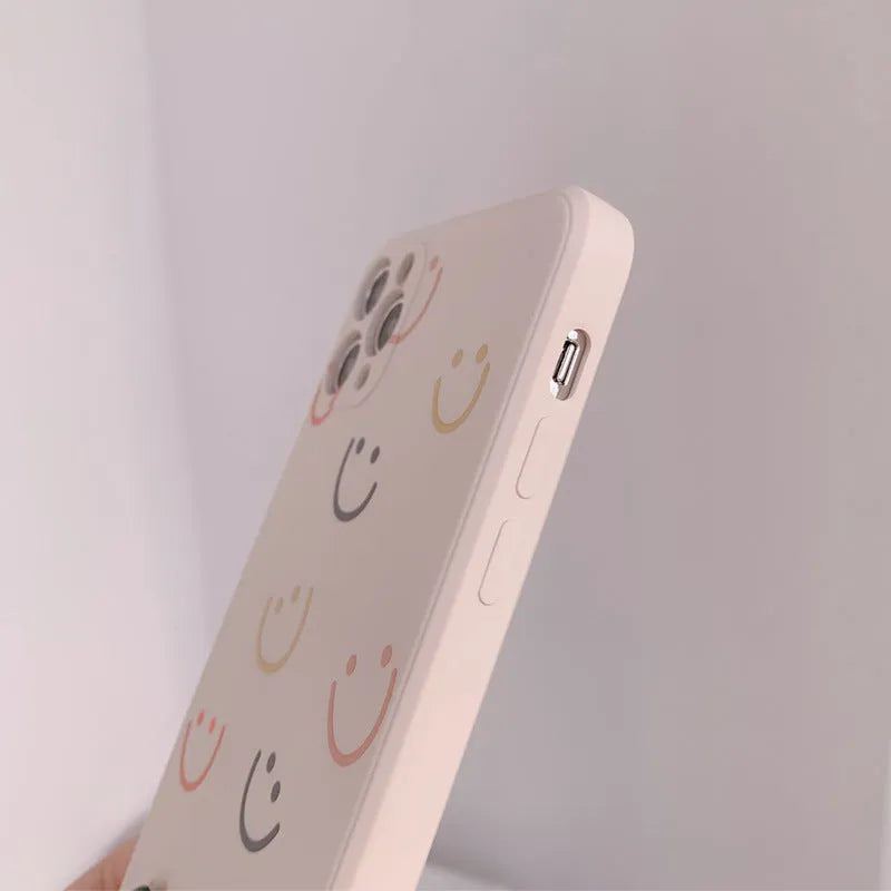 Simple Case Silicone iPhone case in graffiti design, showing Full Screen Smiley, Rainbow, and Watercolor colour options.
